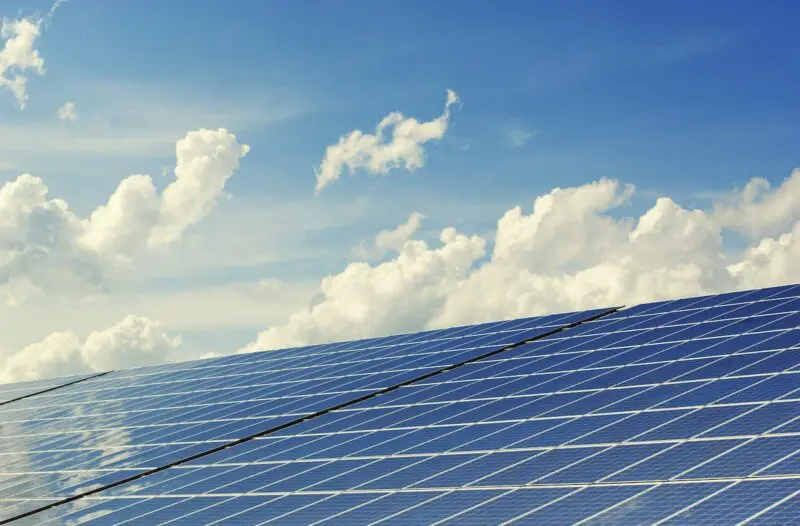 Solar panels on a sunny day with a clear sky.